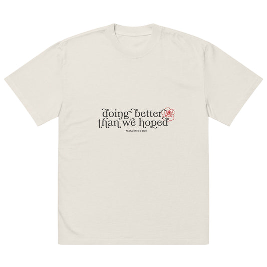 "doing better than we hoped" Oversized faded t-shirt